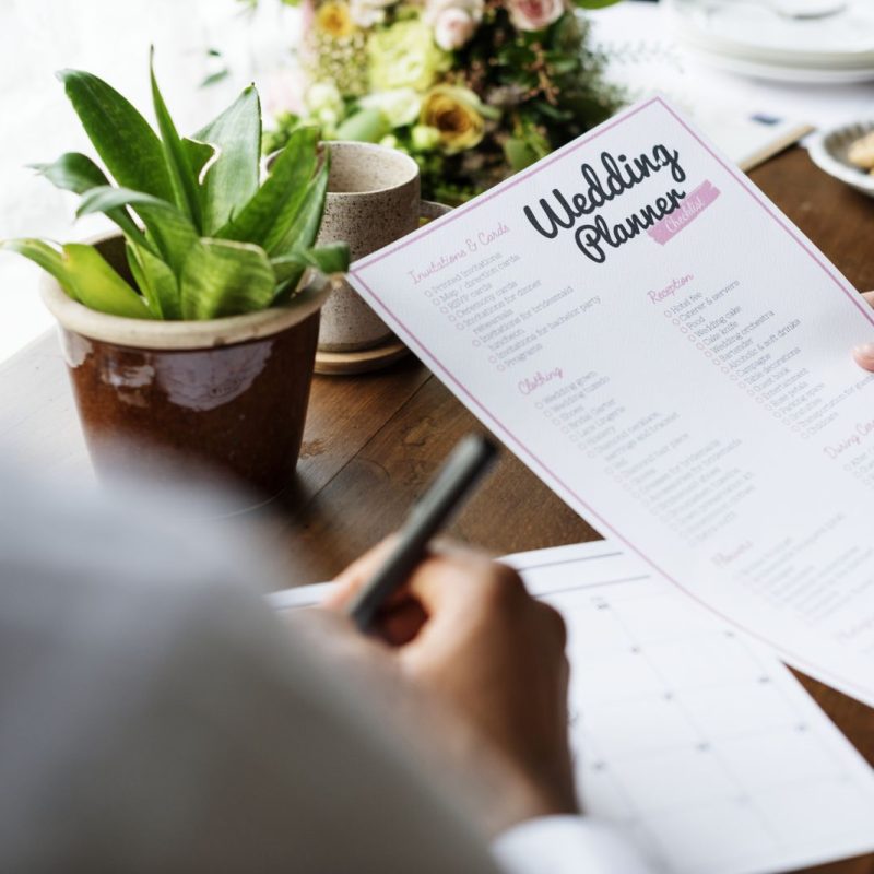 Hands Holding Wedding Planner Checklist Information Preparation Hands Holding Wedding Planner Checklist Information Preparation